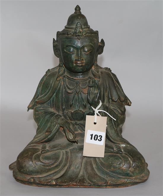 A Chinese bronze seated figure of a Buddha 29cm